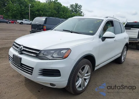 2014 Volkswagen Touareg Tdi Executive z USA, uszkodzony, nr VIN WVGEP9BP7ED001268